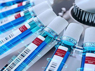 Test tubes with barcodes spread on a table